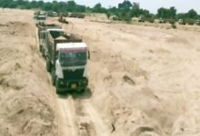 Large scale gravel mining in Krishnavati river near Jawal - dumpers running day and night