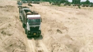 Large scale gravel mining in Krishnavati river near Jawal - dumpers running day and night